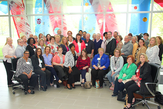 CLIA laboratory surveyors from 10 states and two CMS regional offices gather at the State Hygienic Laboratory for their annual Midwest Consortium Conference.  Nancy Grove, CLIA compliance manager, and Kristi Rotzoll, CLIA compliance specialist, (fourth and third from the left, respectively) are the Iowa laboratory surveyors for the Centers for Medicare and Medicaid Services (CMS) CLIA Laboratory Program.