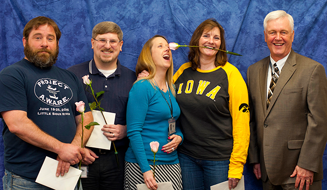 Reaching a 15-year anniversary with the Hygienic Laboratory is a reason to celebrate at the annual Reward and Recognition Program for (from left) Seth Zimmerman, environmental analyst; Matt Bielicke, senior application developer; Amanda Hughes, environmental manager; and Karen Owens, environmental lab analyst. Director Christopher Atchison joins in the celebration.